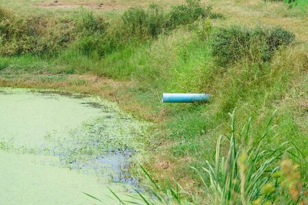 PVC drainage pipes in irrigation canal, sewage and water for cultivation