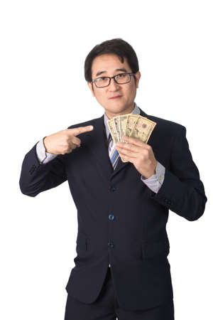 Success Asian businessman holding dollar money, isolated on white backgroundの写真素材