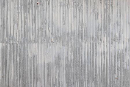 old metal sheet zinc wall texture with peeling paintの写真素材