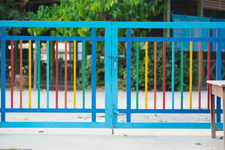 Pink color fence with safety lock at kindergarten or preschoolの写真素材