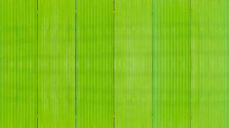 Metal sheet with green color painted background and textureの写真素材