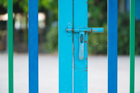 Pink color fence with safety lock at kindergarten or preschoolの写真素材