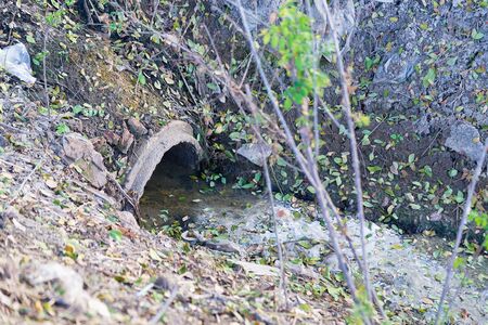 Old concrete drain water in fish farms, drainage and irrigation system.
