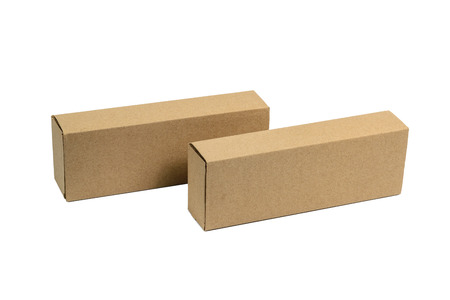 Two long rectangle closed brown cardboard box packaging blank template in isolated on white background.の写真素材