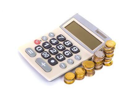Savings, increasing columns of coins, piles of coins arranged as a graph and calculator on white background, business idea, shallow focus.の写真素材