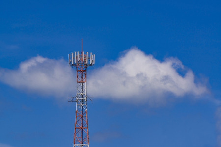 Mobile phone communication antenna tower with the blue sky and clouds, Telecommunication tower