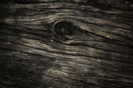 Raw wood, wooden slatted fence or lath wall background texture in vintage tone with vignetting.の写真素材