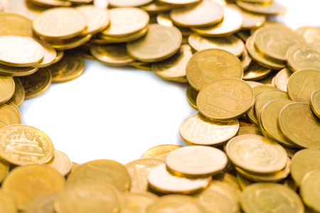 Columns of gold coins, piles of coins arranged on white background, business banking idea.の写真素材