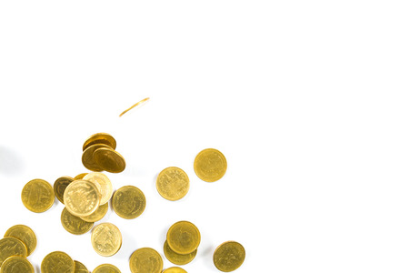 Top view of Falling gold coins money isolated on the white background, business wealth concept.