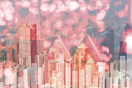 Double exposure of model house with step of coins stack on city background and financial graph, real estate investment and saving banking money finance concept.の写真素材
