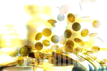 Double exposure of coin stacks with financial graph and copy space for business and financial concept idea. shallow focus.の写真素材