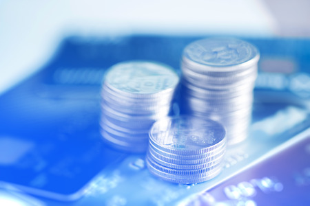 Stacks of coins and account book or credit card with copy space, finance and business finance...