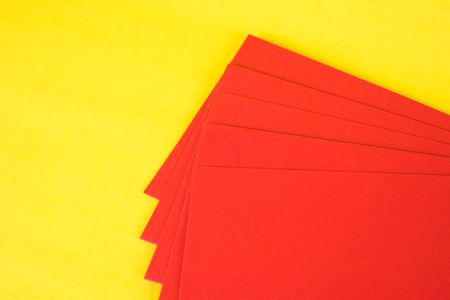 Blank red envelop on yellow background with space for add text, Chinese new year concept idea.の写真素材