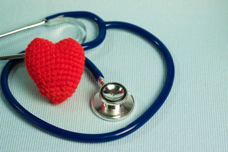 Crochet red heart form and stethoscope, healthy and healthcare concept idea.の写真素材