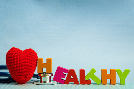 Text healthy alphabet with stethoscope, healthy and health care concept idea.の写真素材