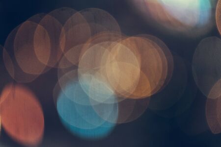 Abstract blur light bokeh background, vintage tone for decorationの写真素材