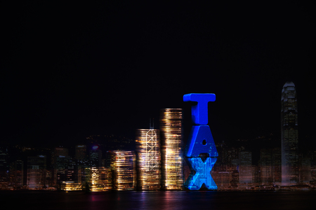 Double exposure of TAX alphabet with stack of coin on city background and financial graph, business and financial Time to pay TAX concept idea.の写真素材