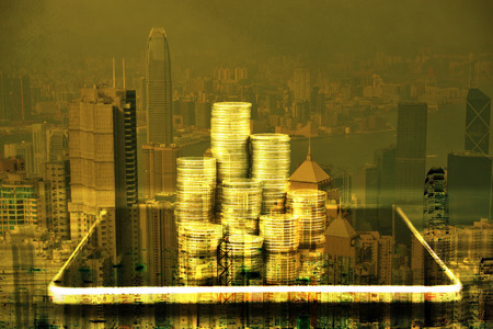 Double exposure of coins stacks with tablet on city background and financial graph, business planning vision and finance analysis concept idea.の写真素材