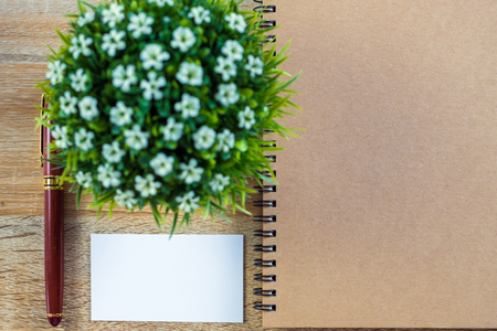 Blank business card or name card with space for add text name address with notebook organizer on working table, financial company concept idea. top view.の写真素材