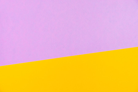 Pastel colored paper flat lay top view, background texture, pink, purple, yellow, orange colour.