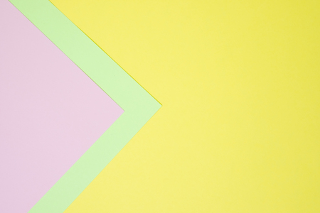 Pastel colored paper flat lay top view, background texture, pink, purple, yellow, beige, green and...