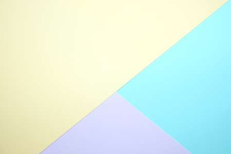 Fashionable  pastel colored paper flat lay top view, geometric background texture, pink, purple, yellow, beige, green and blue colour.の写真素材