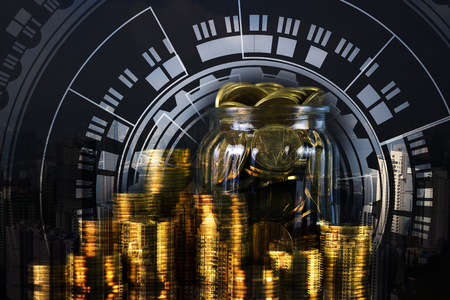 Double exposure of coin stack with infographic technology circle graphic design for financial business and investor analysis concept idea.の写真素材