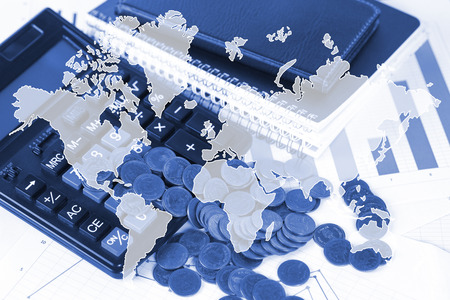 Double exposure of coin stack and financial graph paper sheet with calculator, city background, business planning vision and finance analysis element from Nasaの写真素材