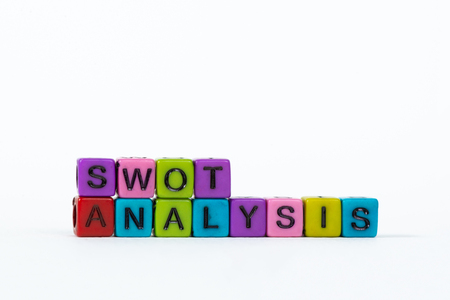 SWOT ANALYSIS text made from colorful beads or letter bead on white background, finance and business concept idea.の写真素材