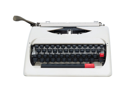 Retro typewriter with blank paper sheet, isolated on white background.の写真素材