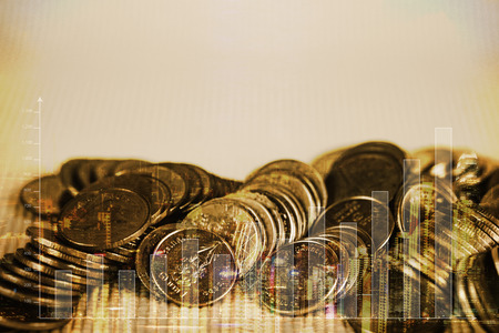 Double exposure Stack of coin with financial graph, business and financial concept idea.の写真素材