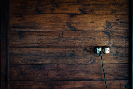 Dark brown wood texture with natural striped pattern for background, wooden surface for add text or design decoration art workの写真素材