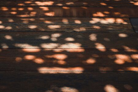 Dark brown wood texture with natural striped pattern for background, wooden surface for add text or design decoration art workの写真素材