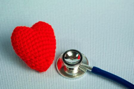 Crochet red heart form and stethoscope, healthy and healthcare concept idea.の写真素材