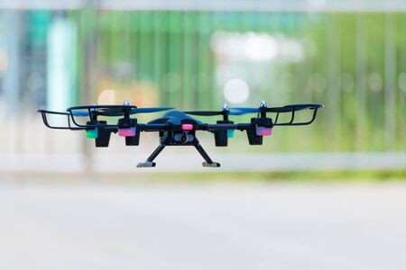 Flying drone of quad copter in the air. spy concept.の写真素材