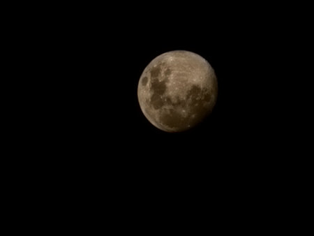 Moon Closeup Showing the Details of Lunar Surface at Night.