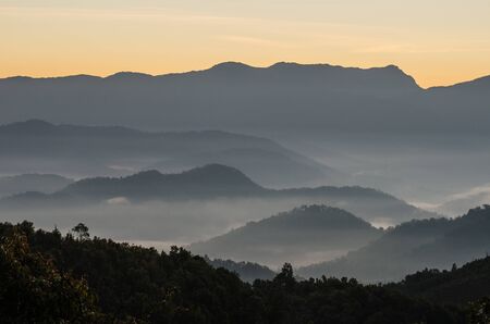 A view from mountains to the valley with smogの写真素材