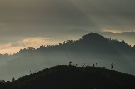 A view from mountains to the valley with lightの写真素材
