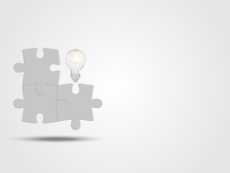 Pieces of jigsaw with light bulb represent thinking of new idea and innovation.のイラスト素材