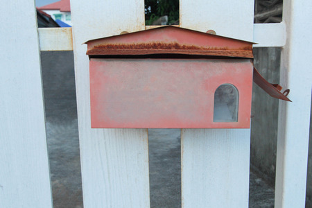 red post box in The white wall.の写真素材