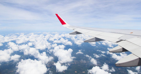 Evening flight on cloud and blue sky, amazing view from the window plane,view from the window plane with cloud and blue skyの写真素材