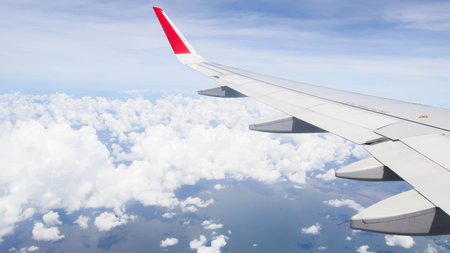 Evening flight on cloud and blue sky, amazing view from the window plane,view from the window plane with cloud and blue skyの写真素材