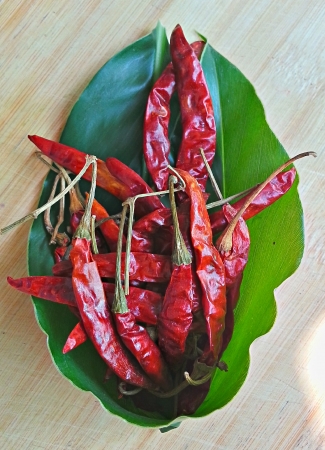 Dry chili put in leaf containerの写真素材
