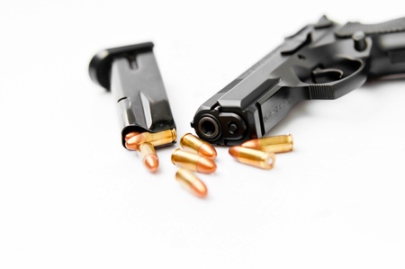 Hand gun and magazine