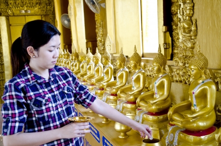 the girl donate for Buddhismの写真素材