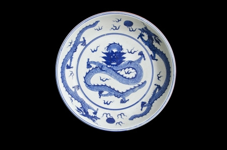 Chinese plate isolated on blackの写真素材