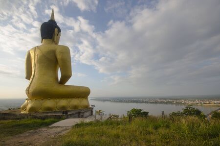 The Golden Buddha at Phu Salao temple near the Mekong river, Pakse, Laos.の写真素材