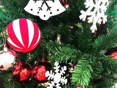 Christmas  tree decorate with balls and ornamentsの写真素材