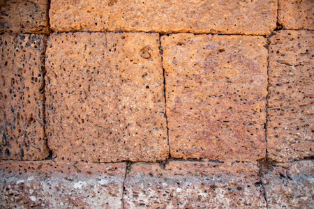orange brown brick wall at Angkor, Cambodiaの写真素材