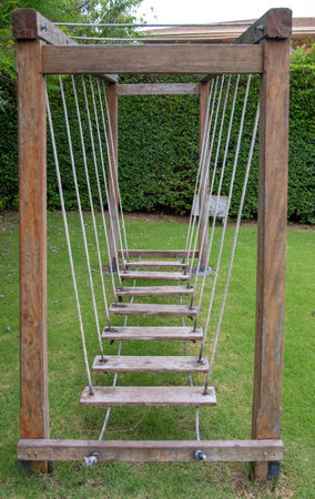 wooden swing in the park without people